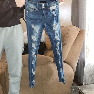 Almost famous holey skinny jeans